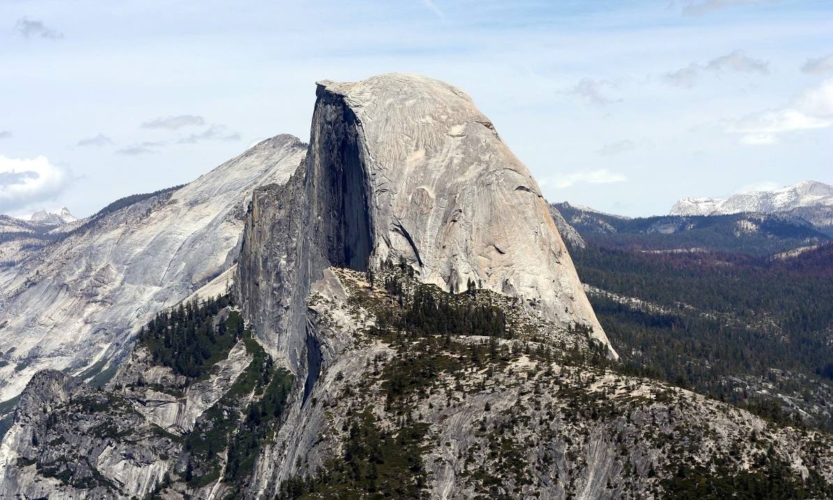 Sunset view of Half Dome with warm orange glow